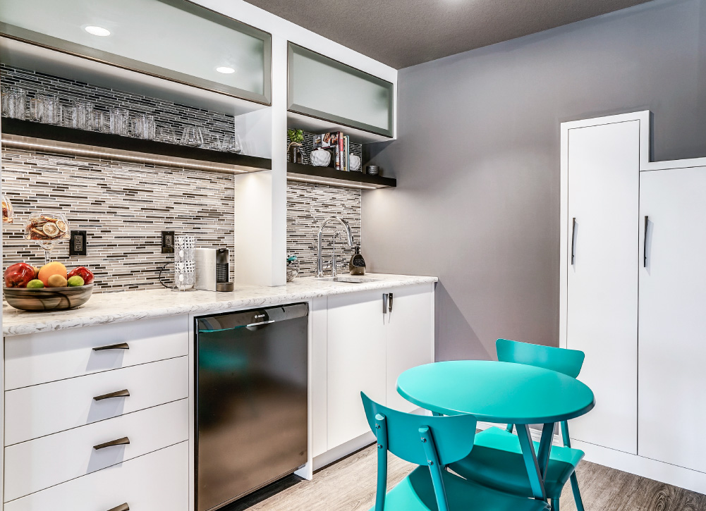 This brightly lit walk-out basement suite was the result of this Calgary basement development