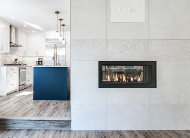 Modern Double-Sided Gas Fireplace - Home renovation by Melanson Homes
