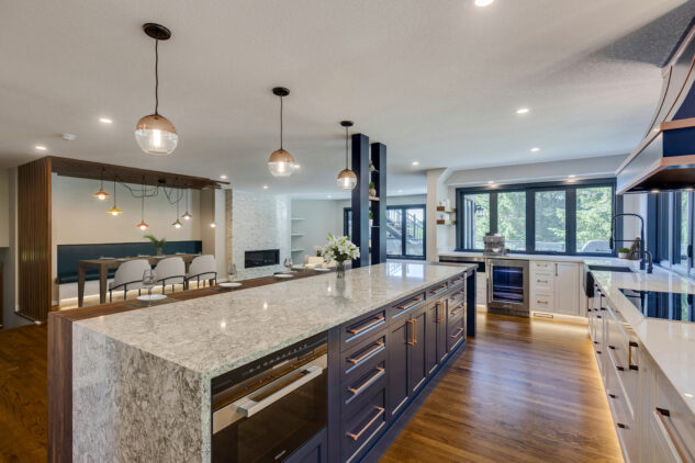 Blue kitchen island with quartz countertops