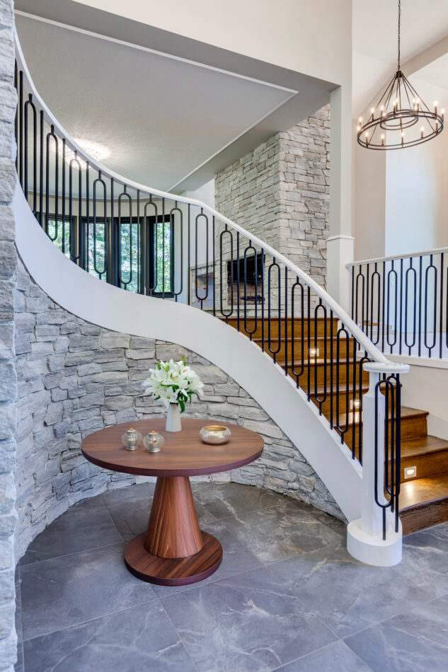 Front stone foyer with round staircase