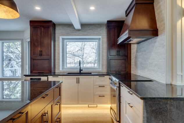 Kitchen with white cabinetry and stained wood cabinetry