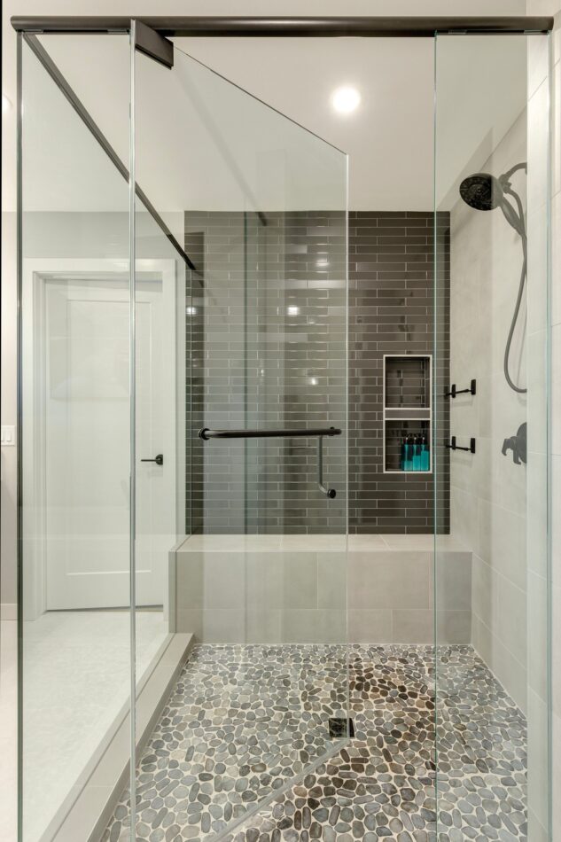 Tiled shower with black feature wall