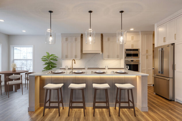 Warm kitchen with white cabinets and stained wood island 