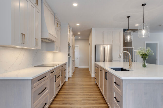 Stained wood lower cabinets with paint grade upper cabinets