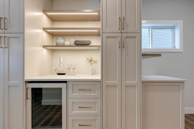 Pantry towers with a wine area and open shelving