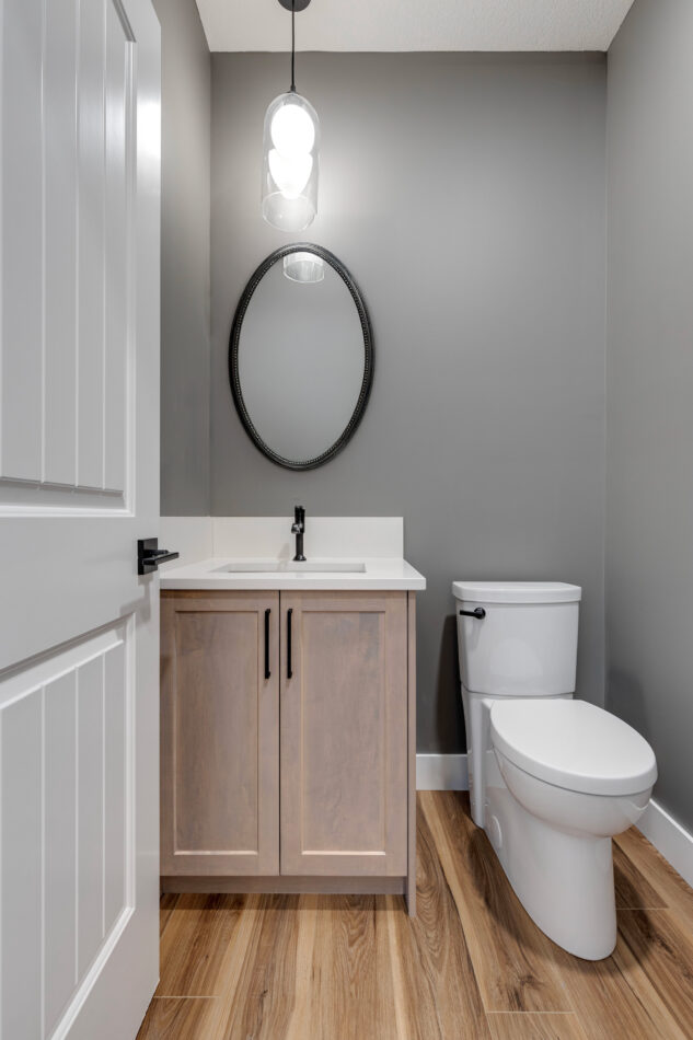 powder room with stain grade vanity