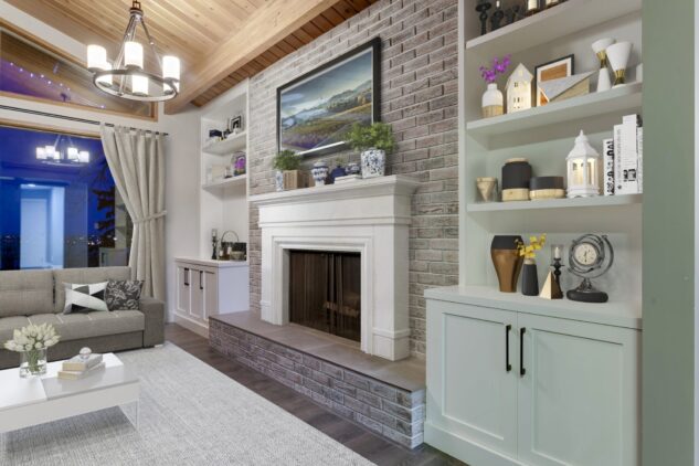 Living room fireplace with white mantle and built-ins