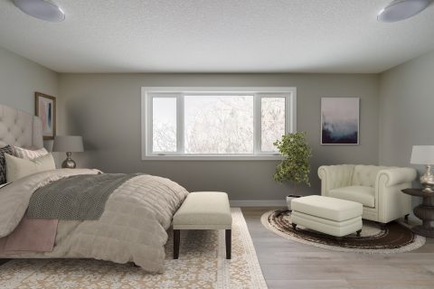 Master bedroom with bed and seating area