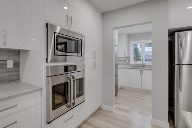 French door wall oven in high gloss custom cabinetry
