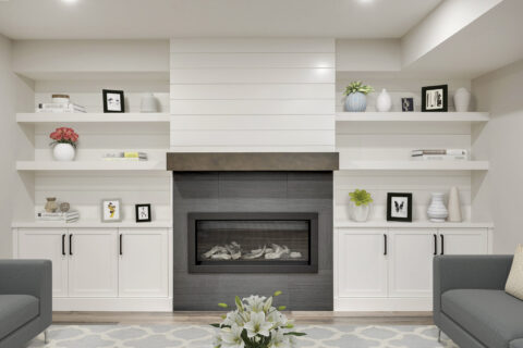 Custom white built-in with stained mantle and gas fireplace 
