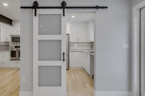 Barn door black hardware with glass French sliding door