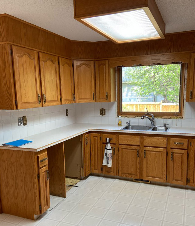 old kitchen with wood cabinets
