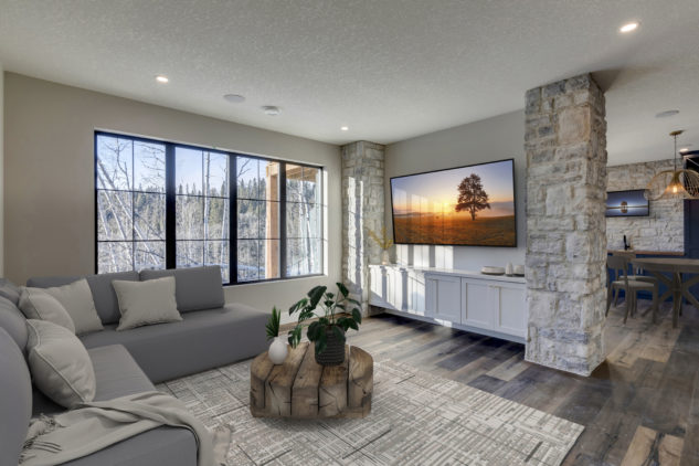 Basement living area with stone columns 