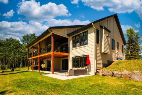 Rear exterior of modern farmhouse bungalow