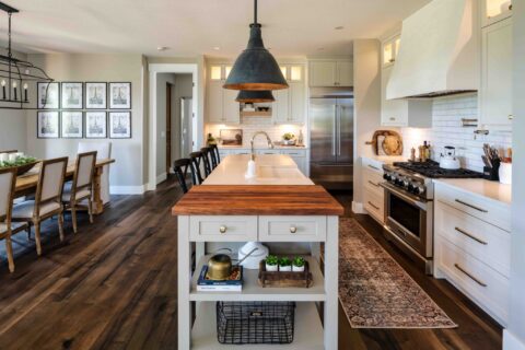 Large kitchen island with quartz and wood worktop