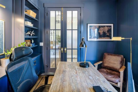 Inside of office with all walls and trim painted in hale navy