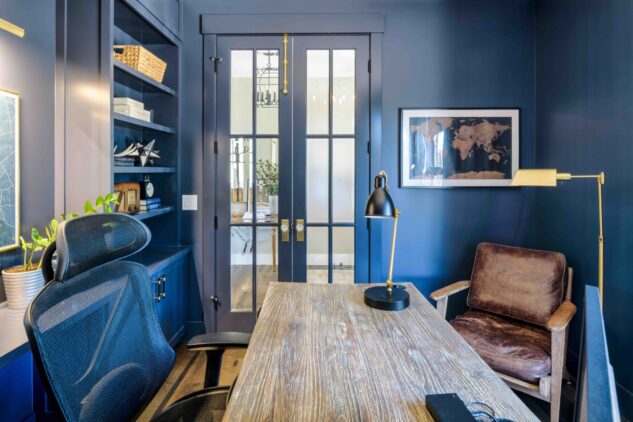 Inside of office with all walls and trim painted in hale navy