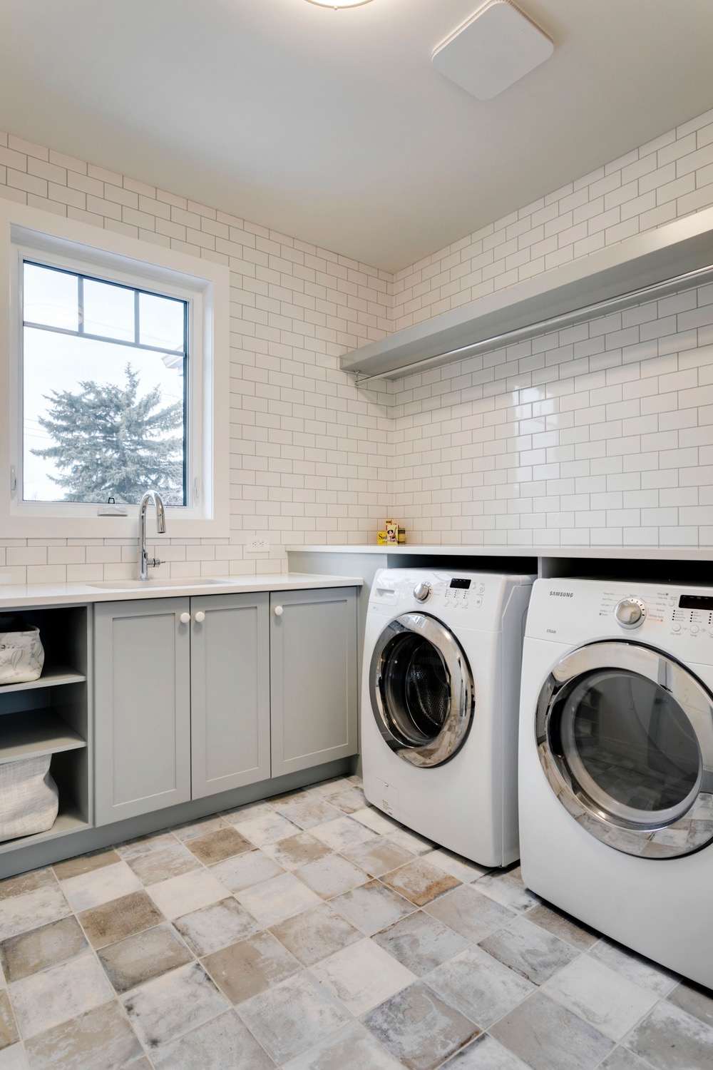 A laundry room with plenty of counterspace.