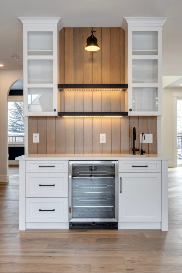 Custom coffee bar with vertical fir shiplap and floating shelves. Calgary infill custom home builder