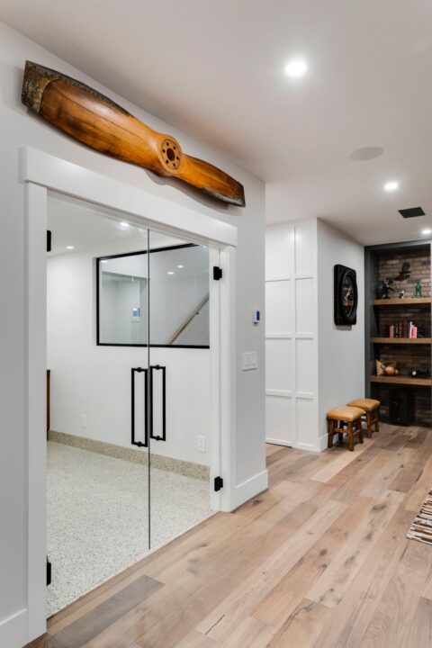 Calgary, Alberta custom home builder. Brewery with epoxy floors and 100m glass. 