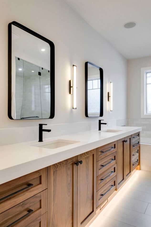 Ensuite with custom walnut vanity and 3