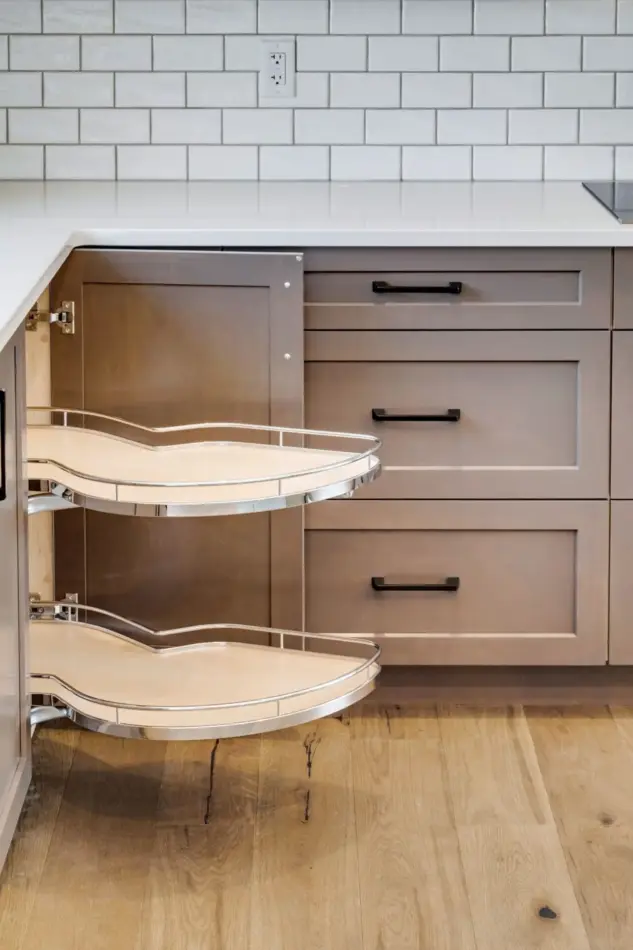 Closeup of LeMans Corner Solution, uniquely shaped shelves that glide out to maximize storage and ease of reach