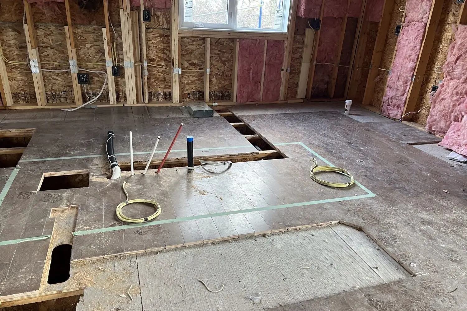 Kitchen area of Rocky View County home during construction and before transformation