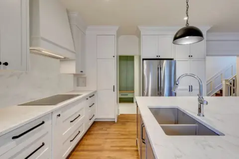 View from kitchen into mudroom and staircase