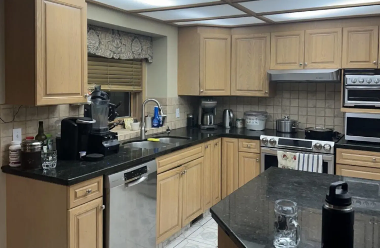 Dark, dated kitchen before renovation