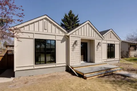 Exterior of Wildwood Calgary home expanded with front and rear additions, and remodeled main floor by Melanson Homes