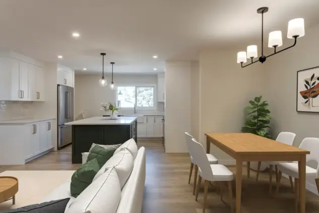 Open concept kitchen and dining area in remodeled Wildwood Calgary home, which was expanded with front and rear additions