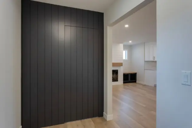 Hidden entrance to office in remodeled Wildwood Calgary home, which was expanded with front and rear additions