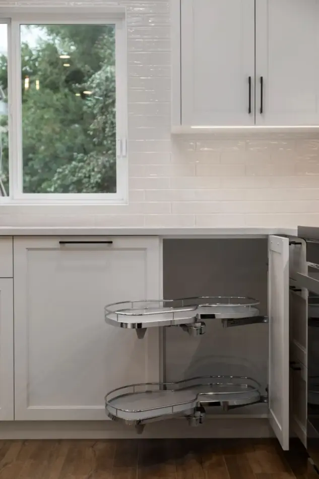 Fully renovated Cranston kitchen with smart storage solutions including the LeMans Corner Solution to maximize cupboard space