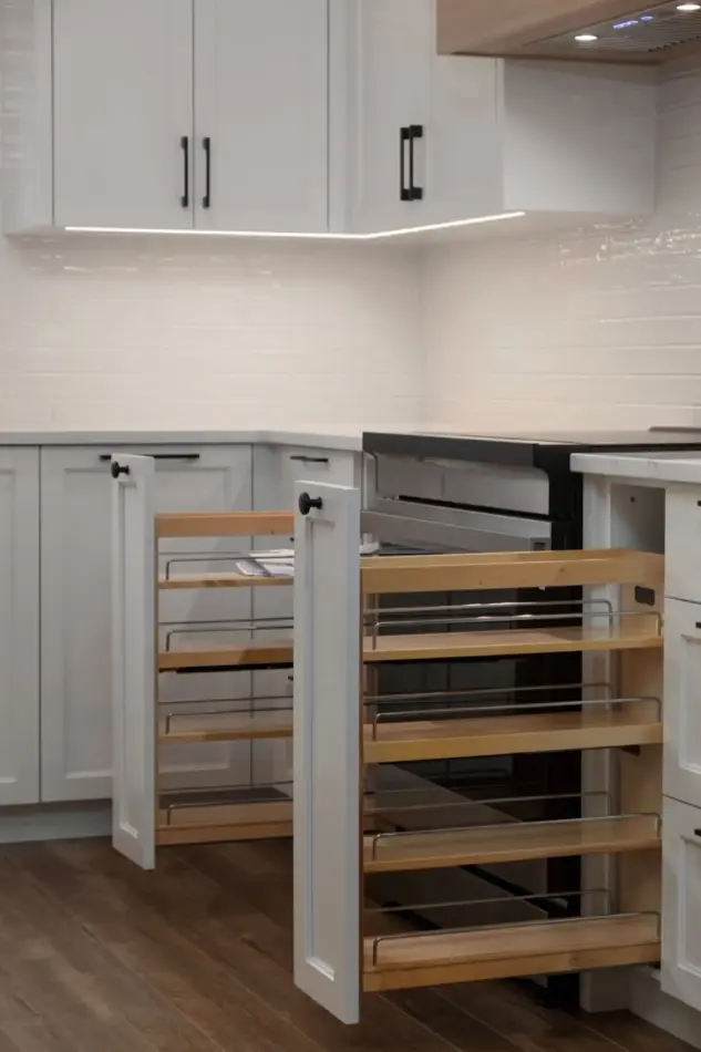Fully renovated Cranston kitchen with smart storage solutions including spice pullouts