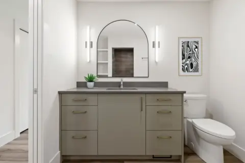 Custom vanity in Varsity home blending natural warmth with minimalist design