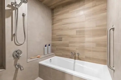 Custom ensuite wet room, built to support traditional Korean bathing rituals, renovated by Melanson Homes