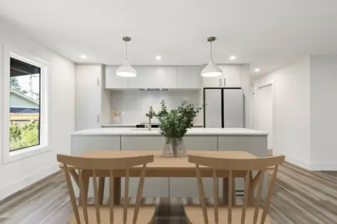 Sleek Japandi style kitchen with modern custom cabinetry after renovation