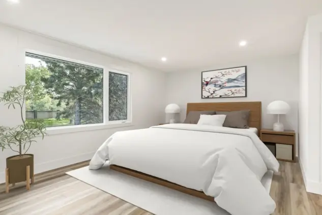 Serene primary bedroom in Varsity home featuring soft neutral tones