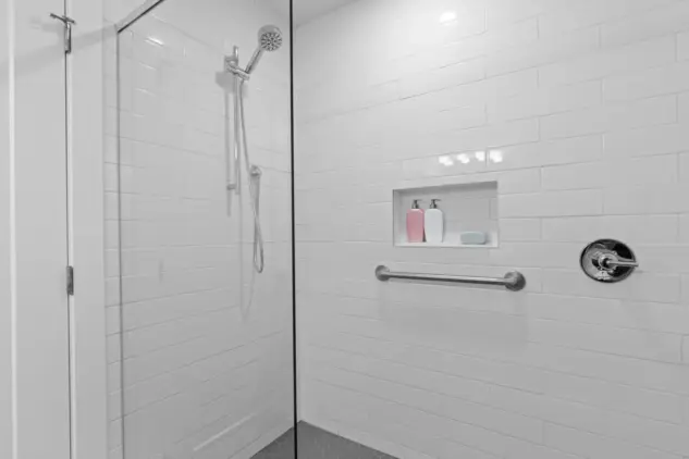 Bathroom walk-in shower in expanded and fully renovated Charleswood home