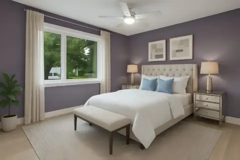 Renovated primary bedroom with large window in Charleswood Calgary home