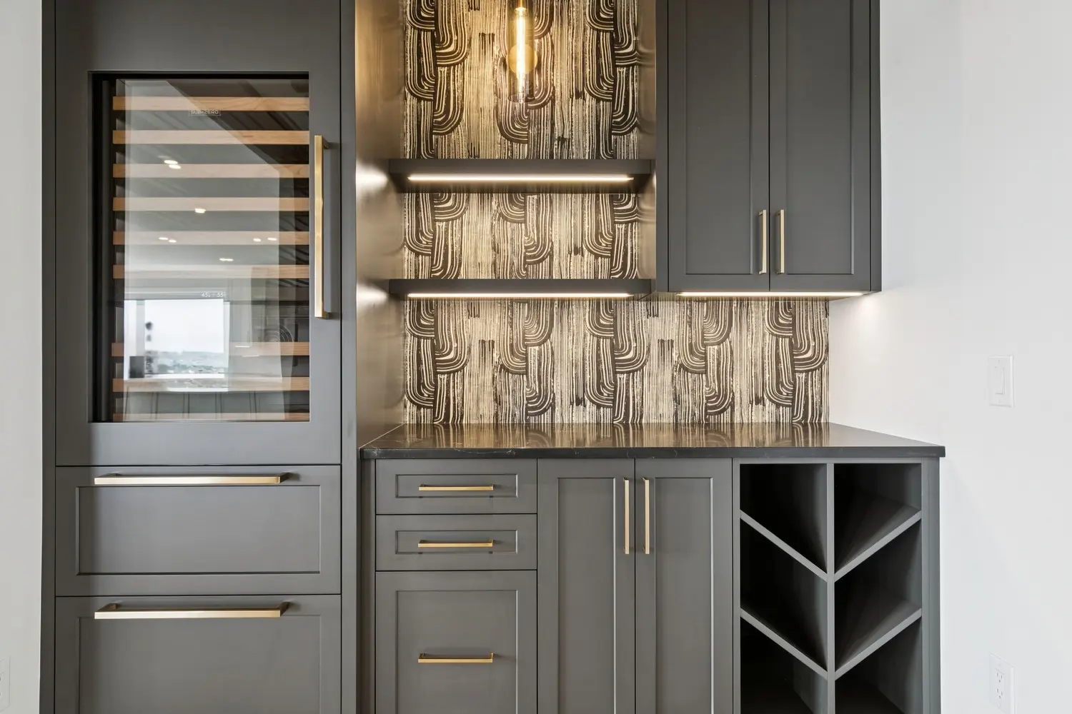 Wine bar with luxe wallpaper feature in remodeled Calgary home